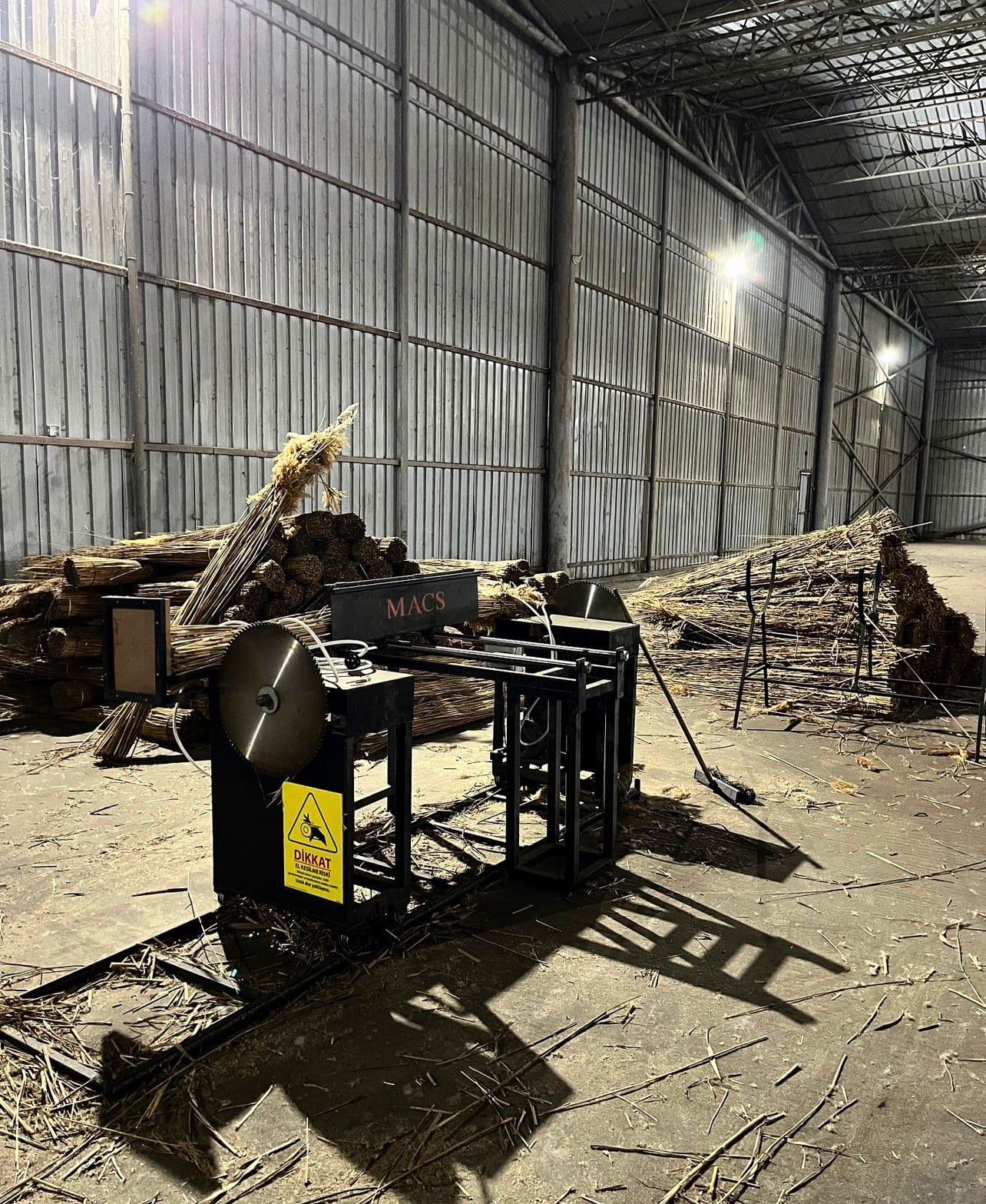 Indoor reed storage showing large stock capacity
