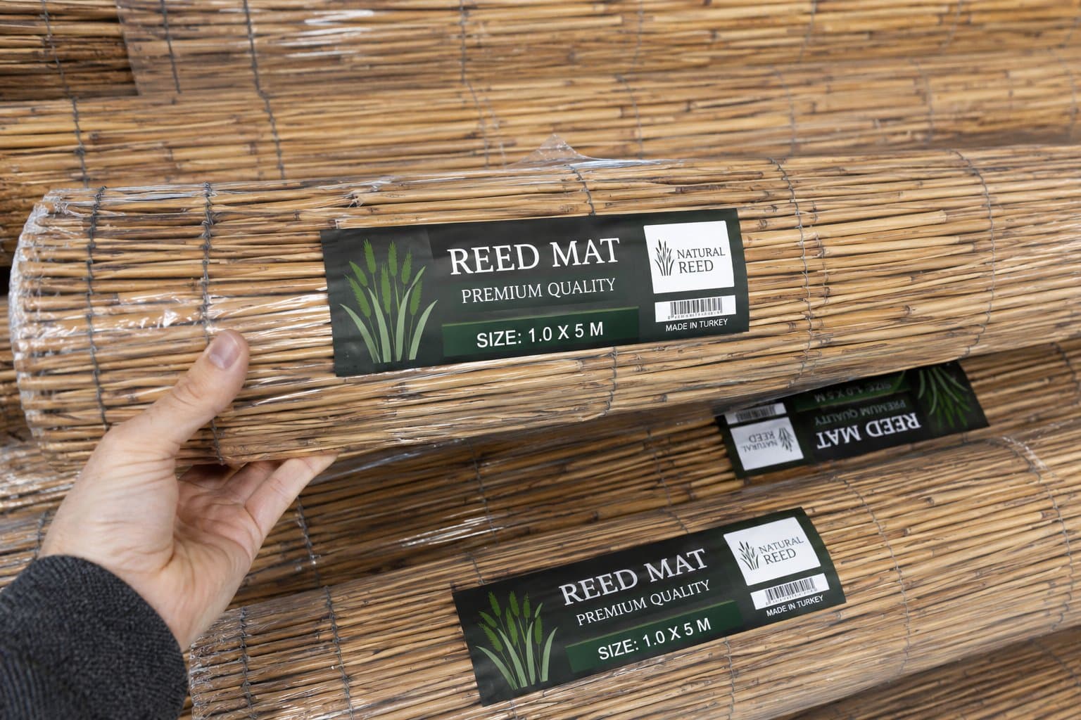 Reed mat rolls with branded packaging