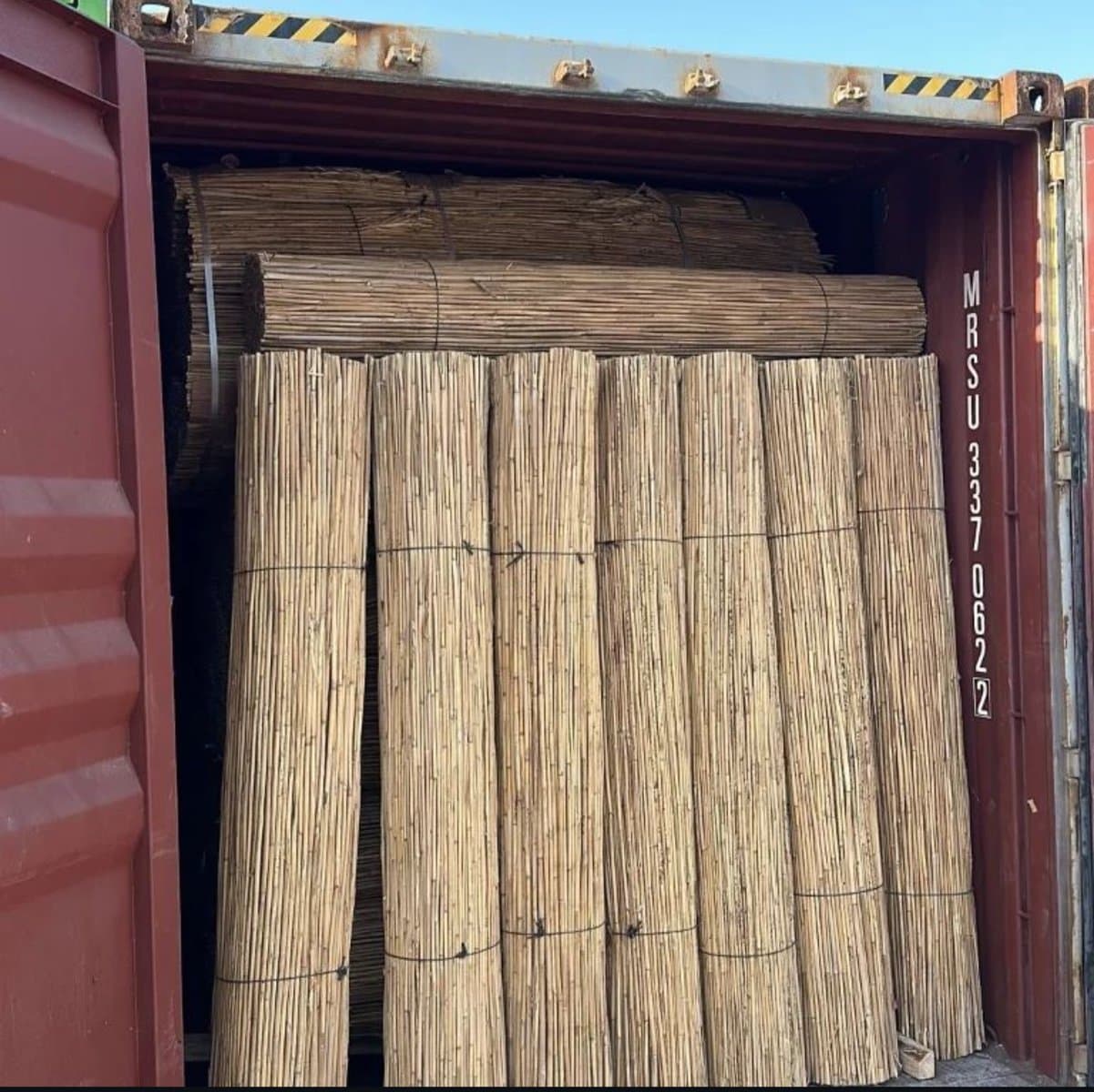 Reed fencing bundles stacked
